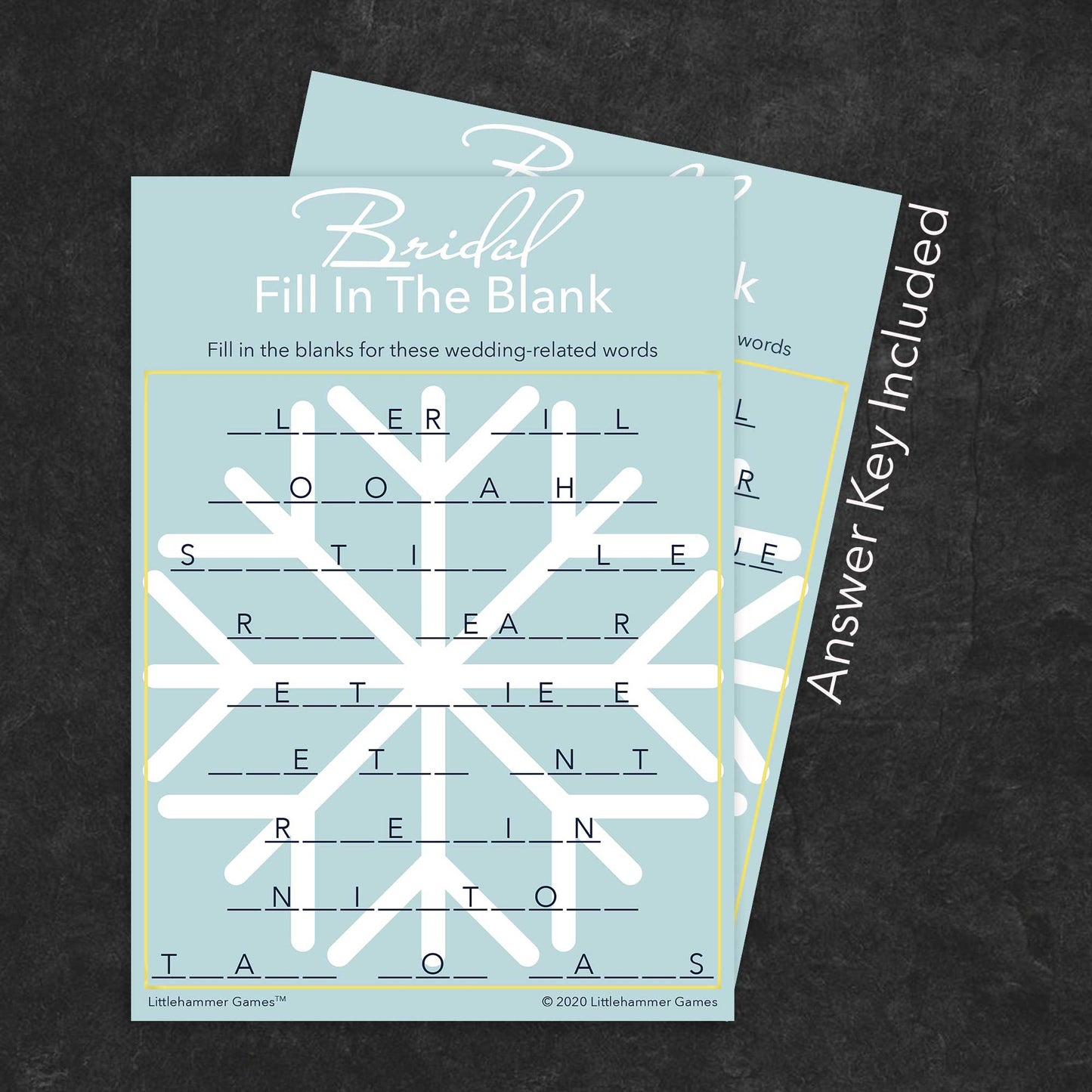 Bridal Fill in the Blank game card with a snowflake background with answer card tucked behind it on a slate background with white text that says "Answer Key Included"