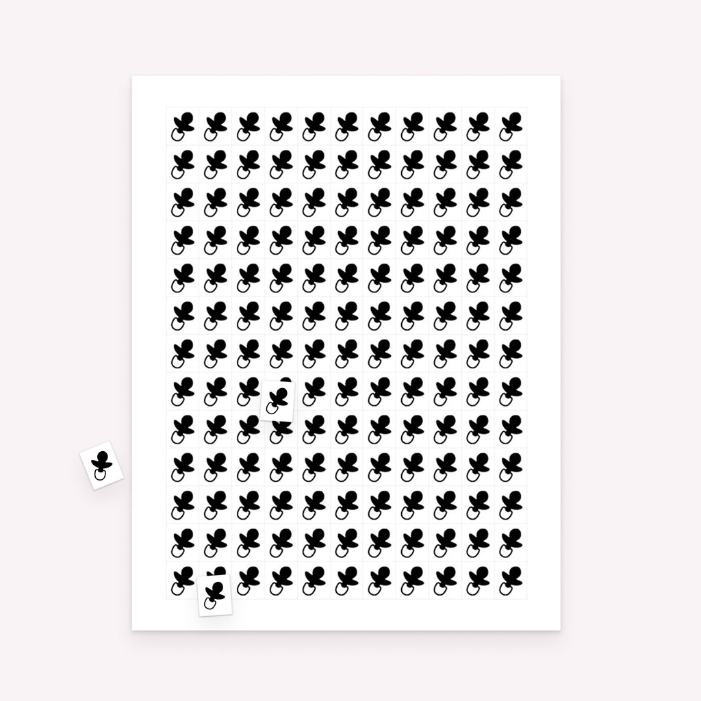 Printable baby shower bingo markers sheet with small rectangular markers and scattered sample pieces for gameplay