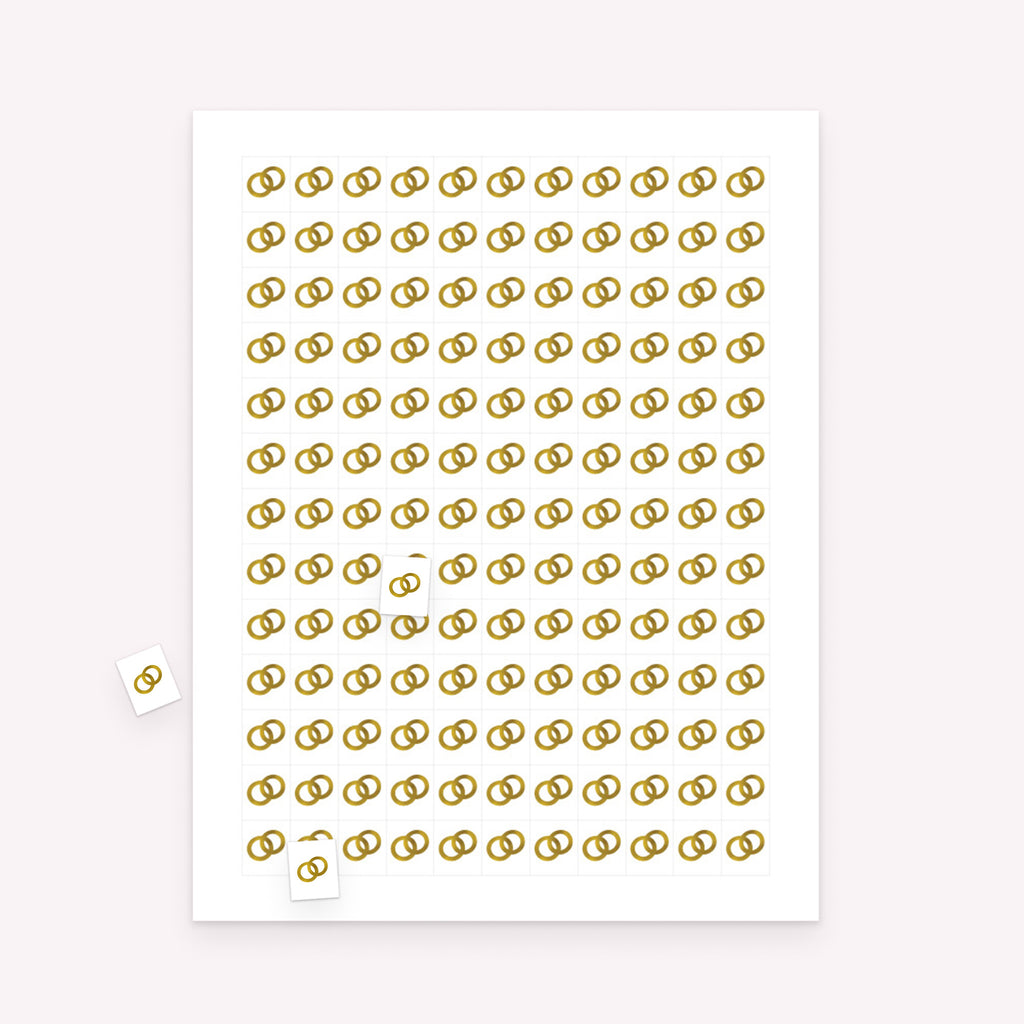 Printable wedding bingo markers sheet with rectangular markers and scattered pieces for bride and groom game