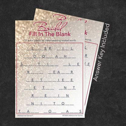 Bridal Fill in the Blank game card with a glittery rose gold background with answer card tucked behind it on a slate background with white text that says "Answer Key Included"