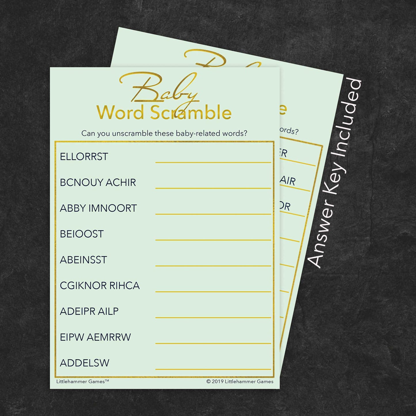 Baby Word Scramble game card with gold text on a mint background with answer card tucked behind it on a slate background with white text that says "Answer Key Included"