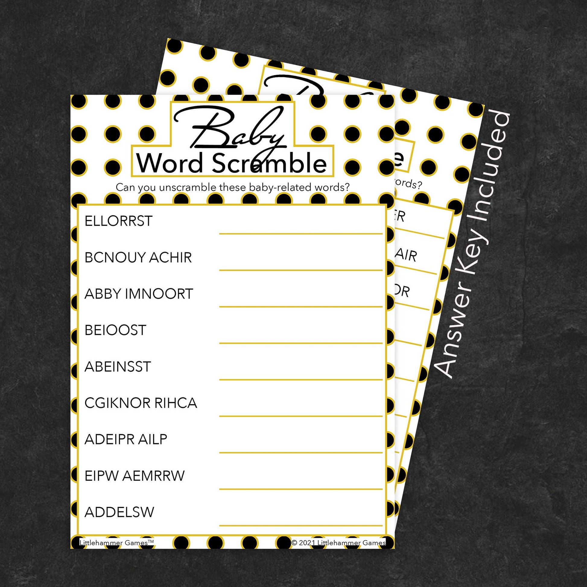 Baby Word Scramble game card with a black and gold polka dot background with answer card tucked behind it on a slate background with white text that says "Answer Key Included"