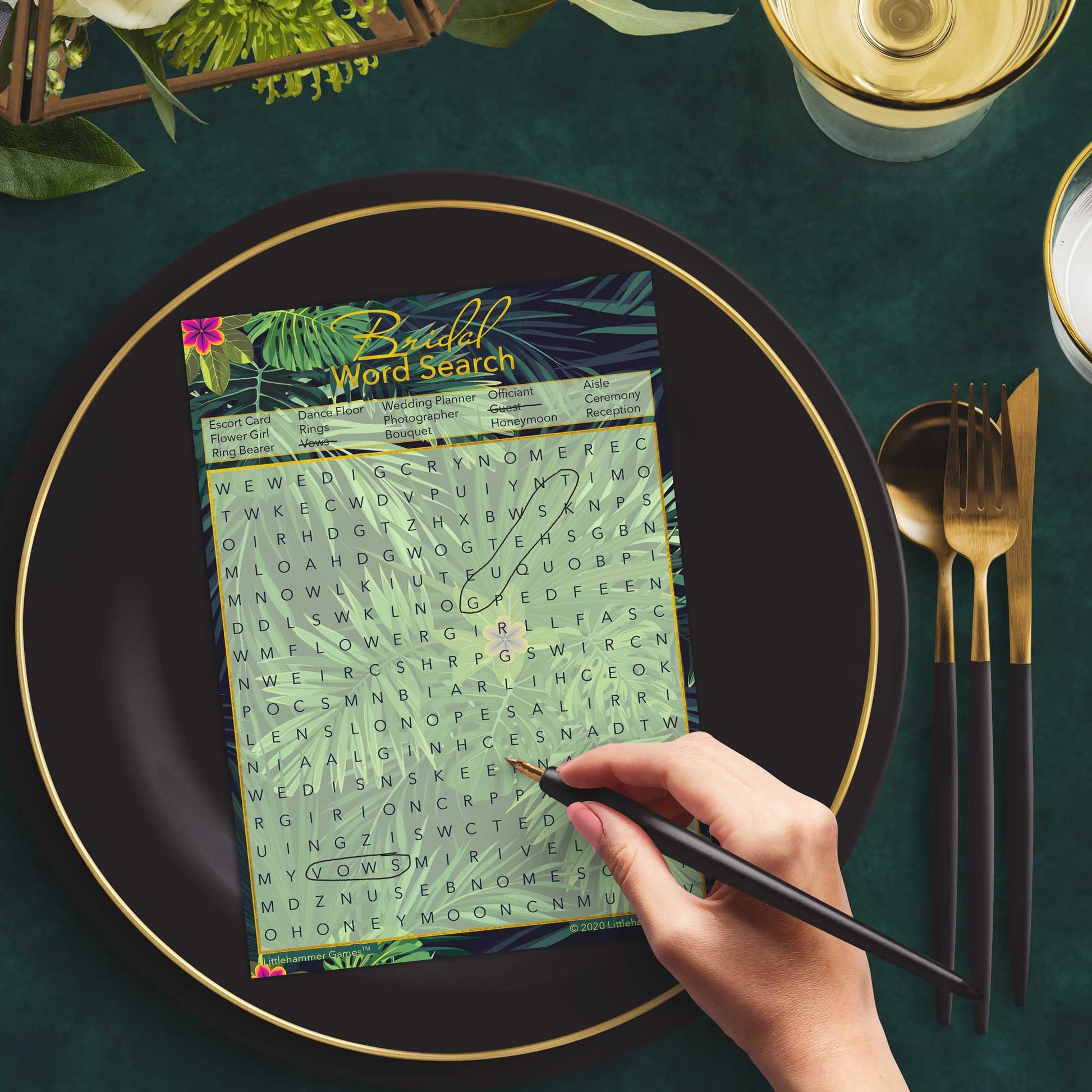Woman with a pen playing a tropical Bridal Word Search game card at a dark place setting